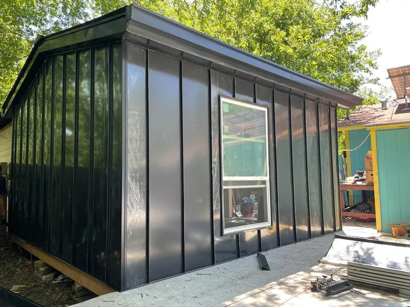 Black standing seam metal wall panels for Roof Inspection in Spokane