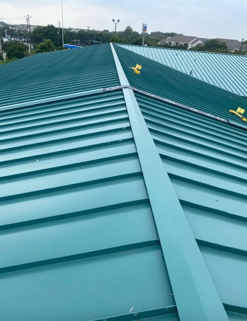 Green commercial metal roof ridge and valley for Metal Roof Repair in Spokane